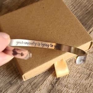 Silver bracelet with anxiety message
